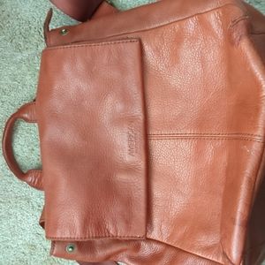 American leather backpack. Please see spot on bottom